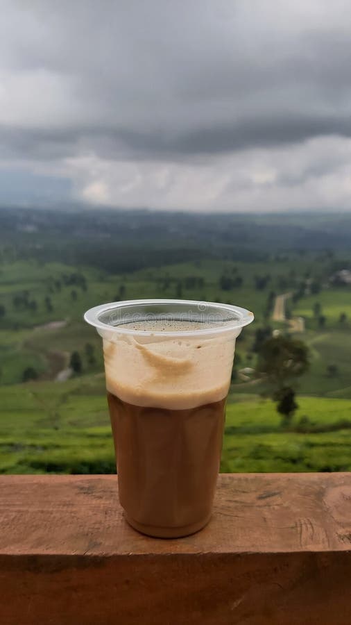 Coffee in a plastic cup stock photo. Image of plastic 261957524