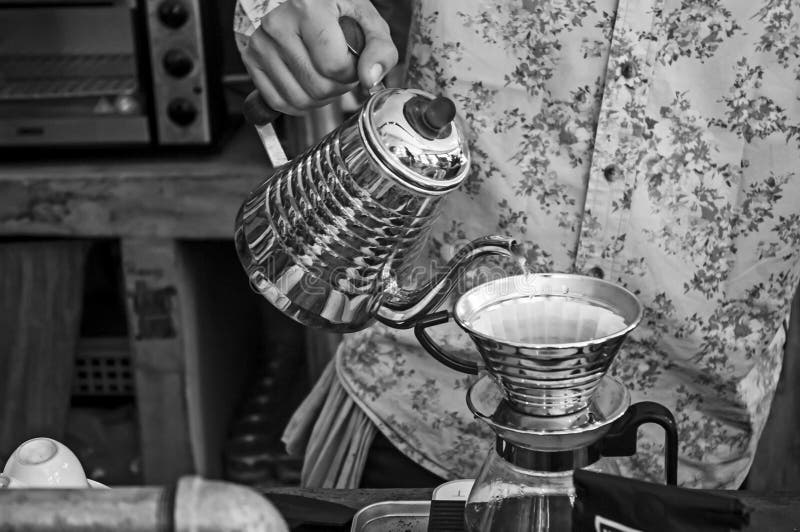 Coffee with pour over technique on black and white tone stock images