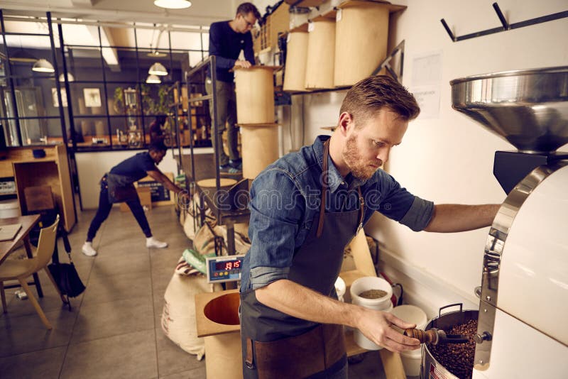 Coffee Roastery and Distribution Company with Men at Work Stock Image