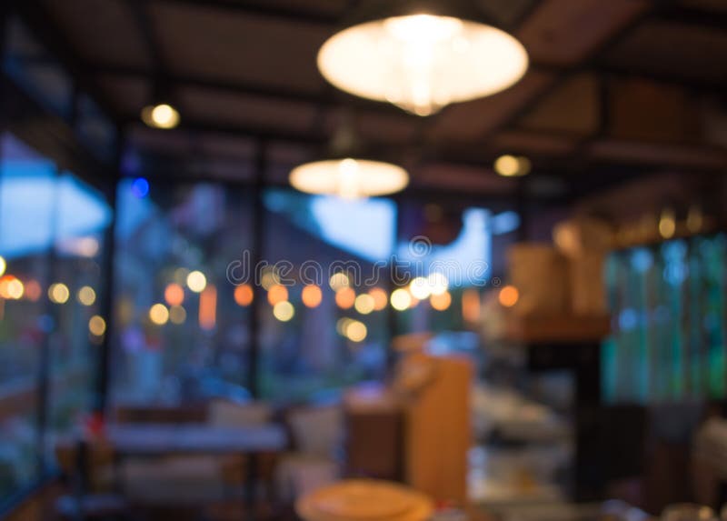 Coffee shopsuddighetsbakgrund med bokeh arkivbild Coffee shopsuddighetsbakgrund med bokeh arkivbild
