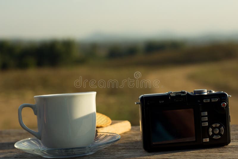 Coffee with snacks meadows as a backdrop, Place the camera with royalty free stock photos Coffee with snacks meadows as a backdrop, Place the camera with royalty free stock photos