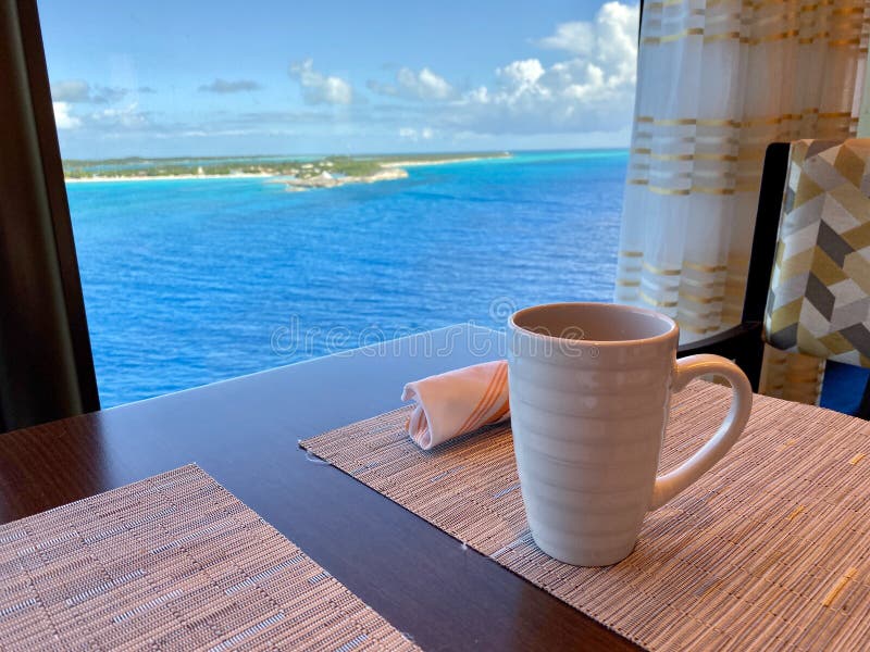 Coffee on a Table Aboard a Cruise Ship Overlooking the Beautiful