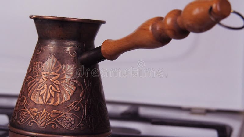 https://thumbs.dreamstime.com/b/coffee-turka-fire-gas-stove-copper-engraved-turk-coffee-brewer-white-gas-stove-burning-fire-slow-motion-close-88996991.jpg