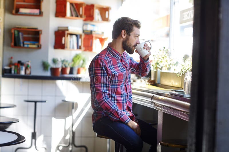 Coffee is the only Way To Start Your Day. a Young Man Drinking Coffee