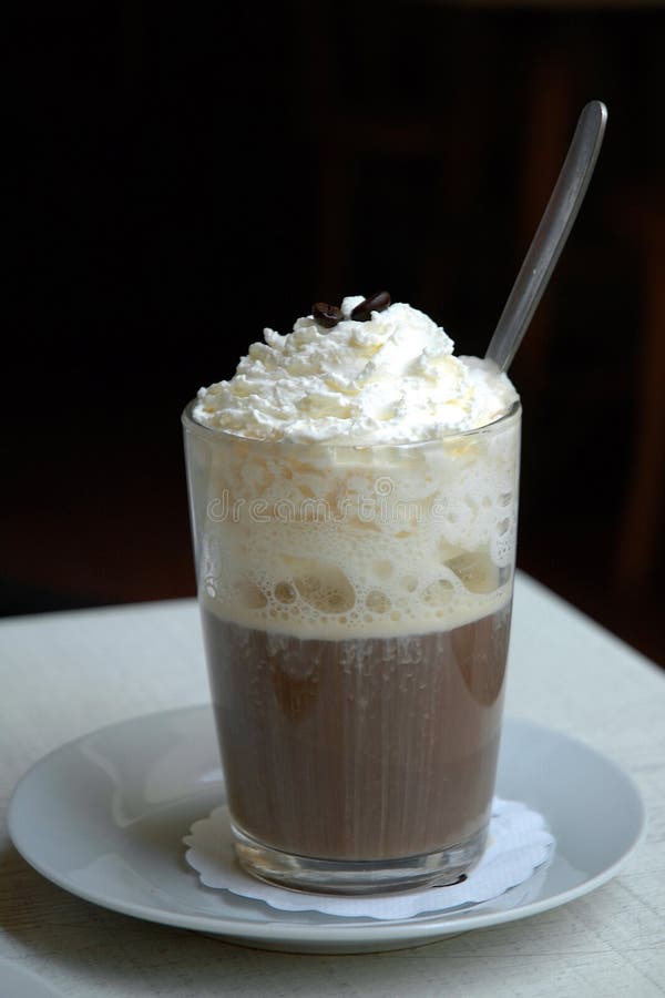 Coffee with whipped cream. stock image. Image of glass 97553985