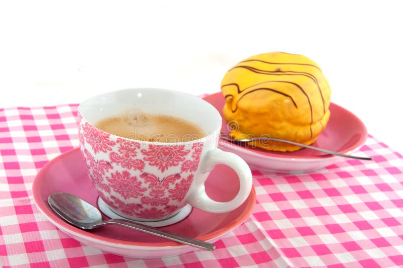 Coffee with yellow cakes stock photo. Image of checked 10562858