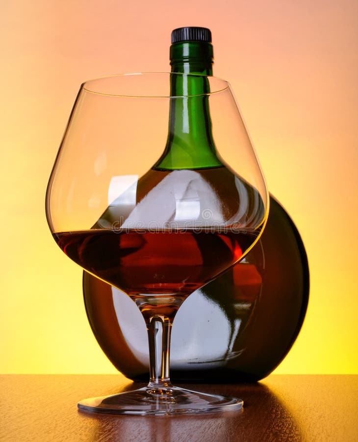 Cognac bottle and glass stock image. Image of enjoyment 14482281
