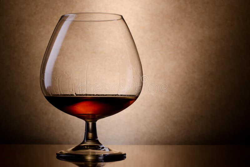 Cognac in a glass stock photo. Image of diner, night 16877478