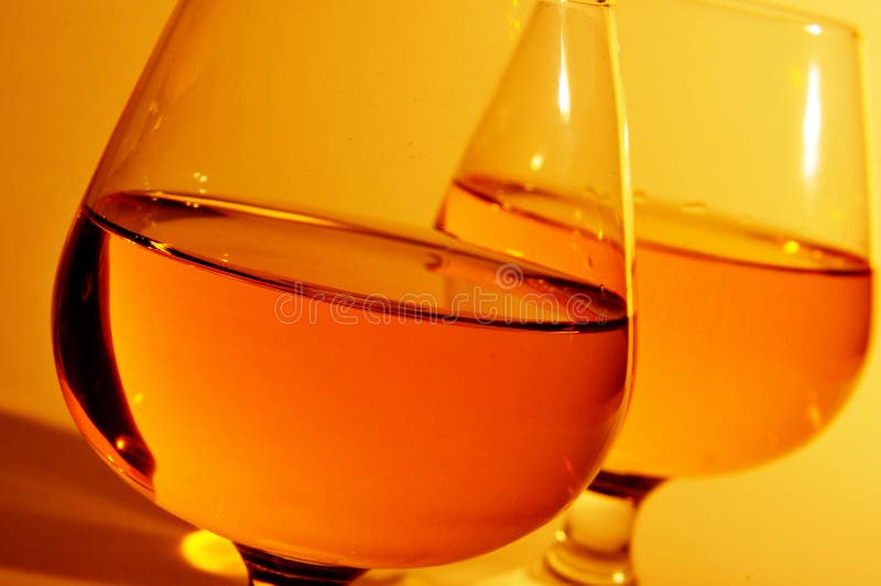 Cognac glasses with brandy stock images Cognac glasses with brandy stock images