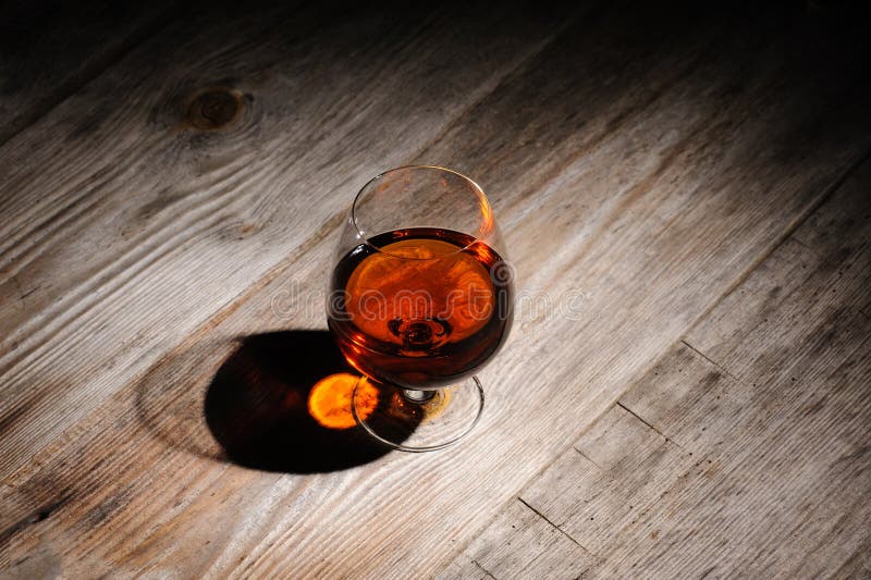 Pack to put instead recovery Cognac on the wooden table stock image. Image of brandy - 157061363