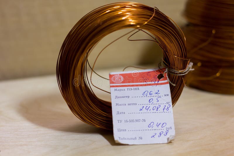 Coils of copper wire editorial photo. Image of metallic 135384656