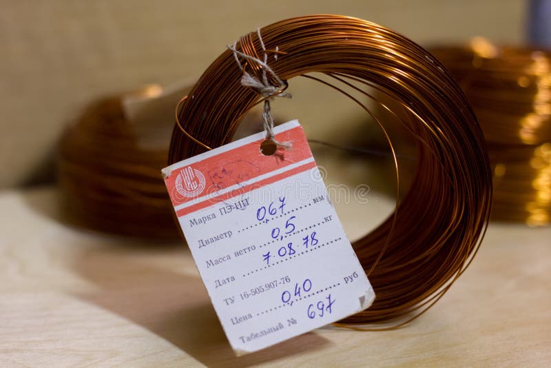 Coils of copper wire editorial photo. Image of metallic 135384656