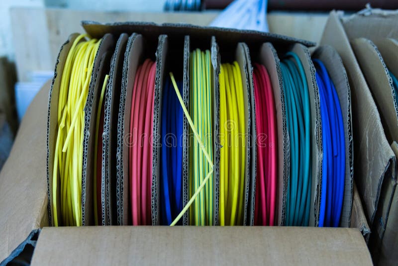 Coils with Multicolored Electrical Wires in the Box Stock Photo