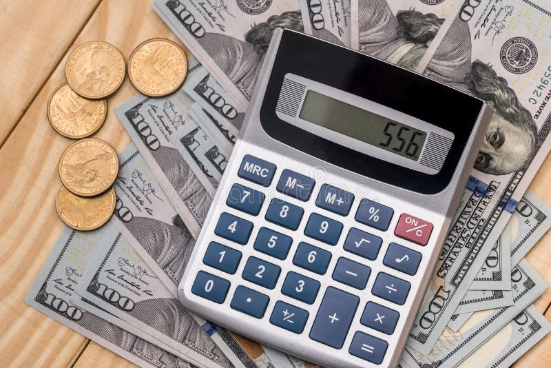 Coin and Dollar Bills and Calculator Stock Photo Image of bill