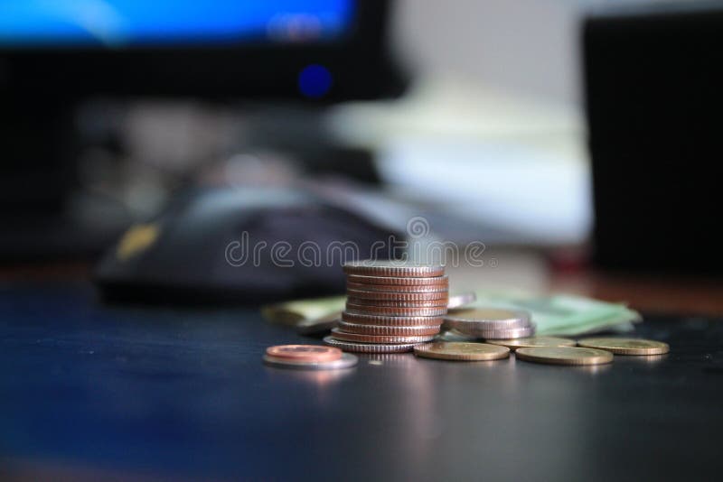 A coin is a graph in a white background. Business Ideas Add a column to your savings. business banking concept idea. Money of Thai royalty free stock image A coin is a graph in a white background. Business Ideas Add a column to your savings. business banking concept idea. Money of Thai royalty free stock image