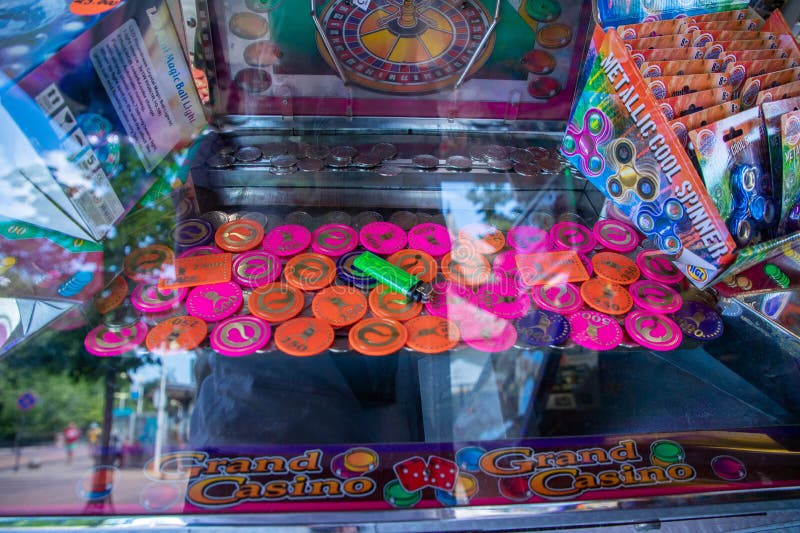 Coin Pusher Machine Featuring a Deck of Cards Stock Photo - Image of  vintage, machine: 231359918