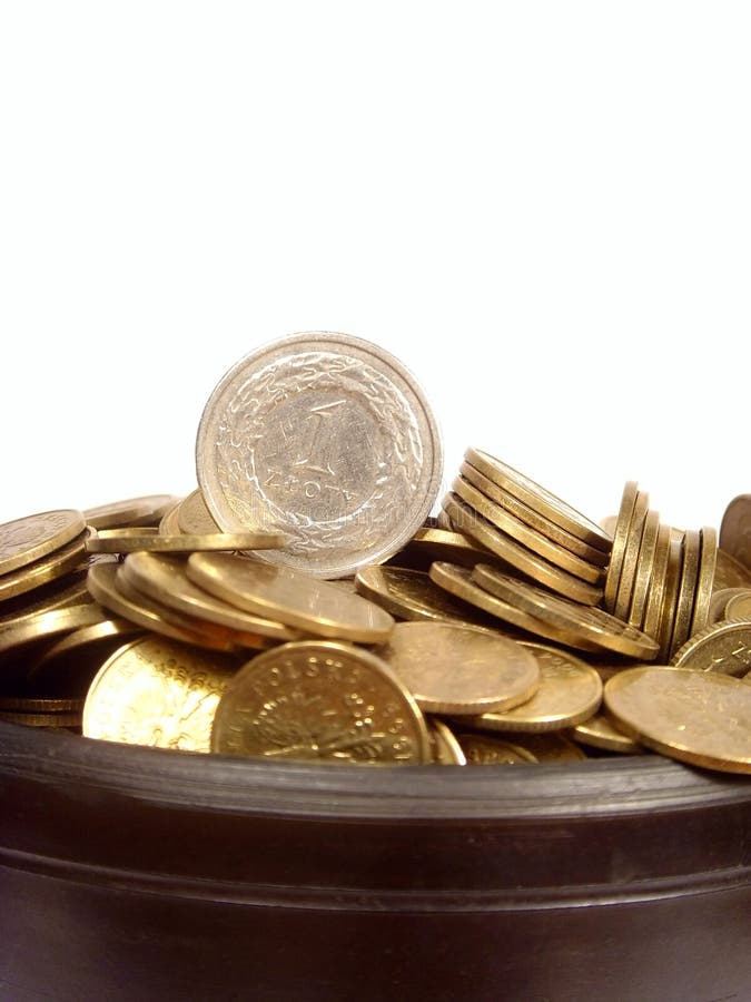 Coins in ancient bowl royalty free stock photos