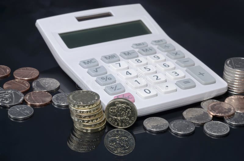 Coins and calculator stock image. Image of black, money - 60076721