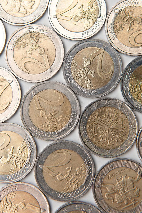 Coins organized in columns and rows isolated line royalty free stock photography