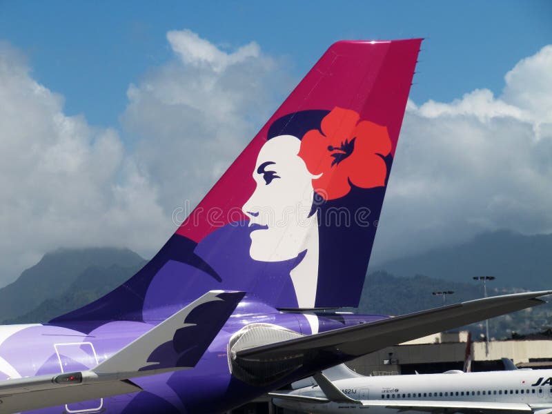 Cola del avión de Hawaiian Airlines, Oahu, Hawaii imagen de archivo Cola del avión de Hawaiian Airlines, Oahu, Hawaii imagen de archivo