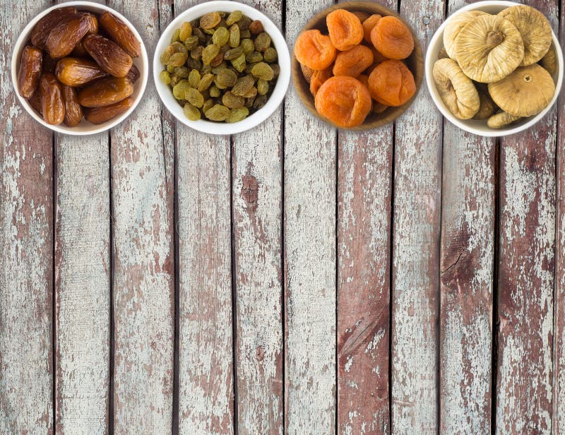 Colagem de frutos secados diferentes Passas, datas, abricós secados imagens de stock Colagem de frutos secados diferentes Passas, datas, abricós secados imagens de stock