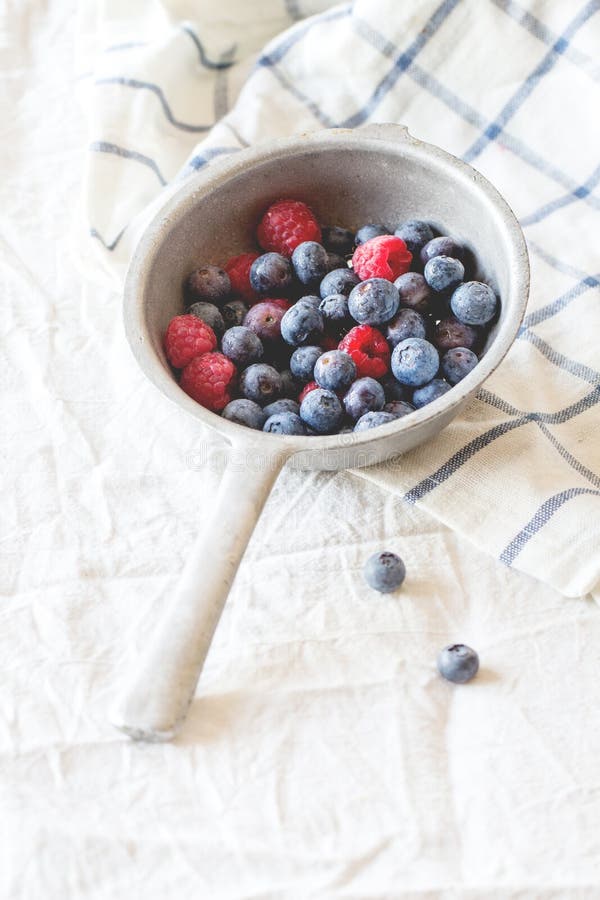 Colander with fresh berries