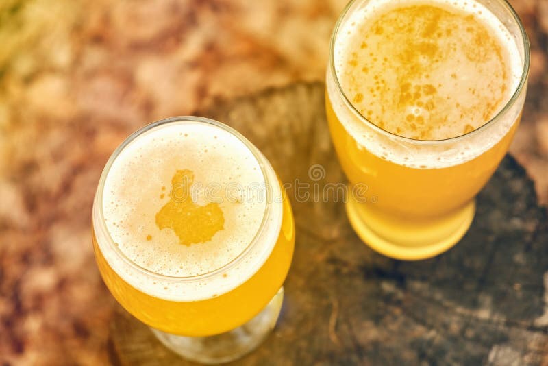 Cold beer on desk and grill time, outdoor stock photography Cold beer on desk and grill time, outdoor stock photography