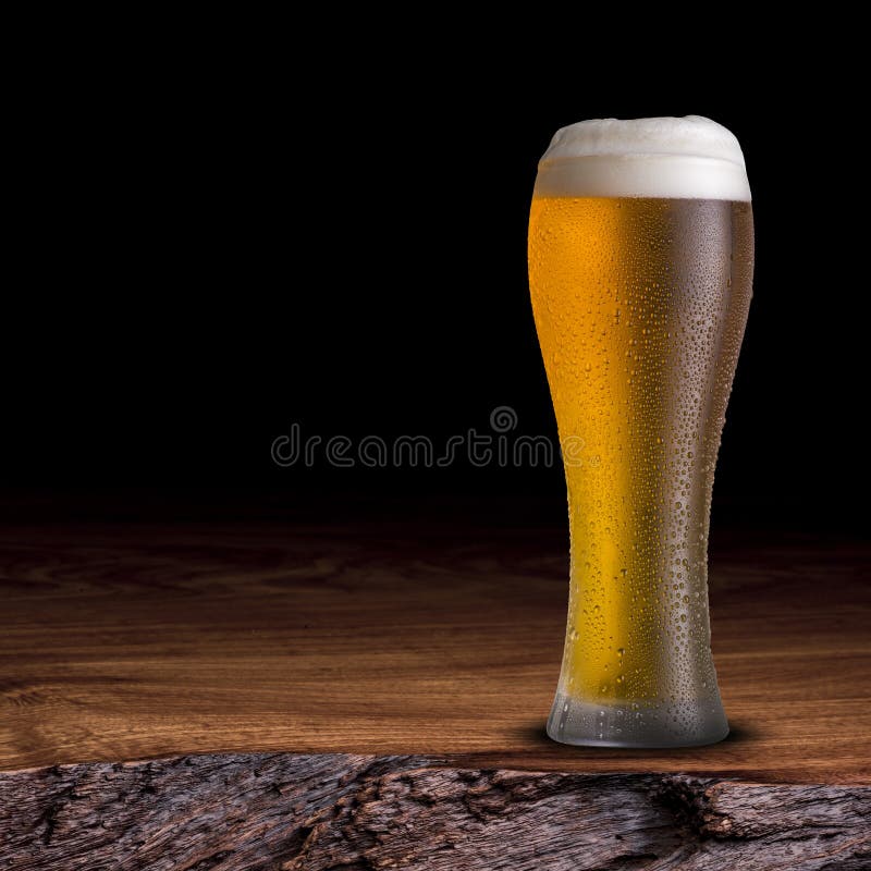 Cold beer on wood table