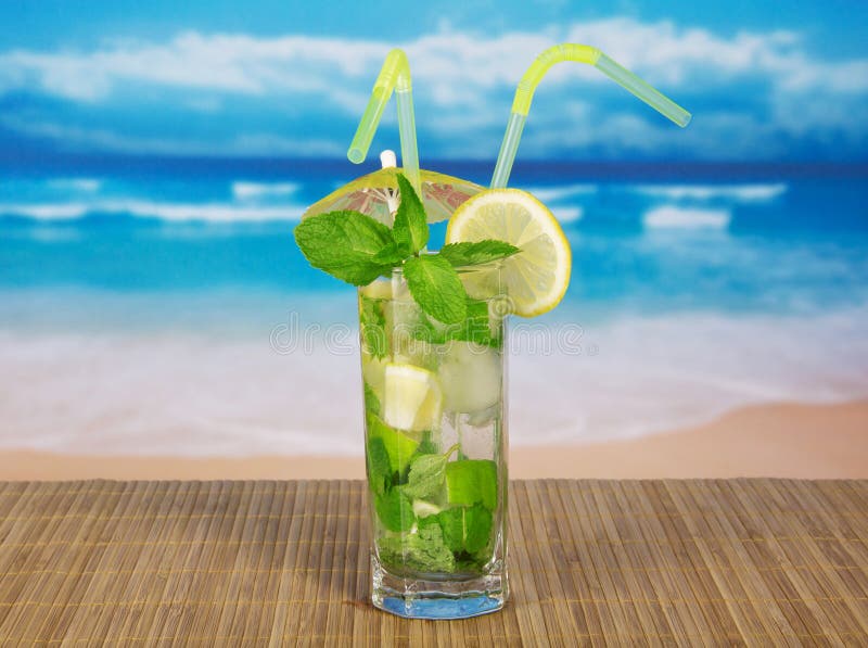 Cold drink with lemon slice and spearmint