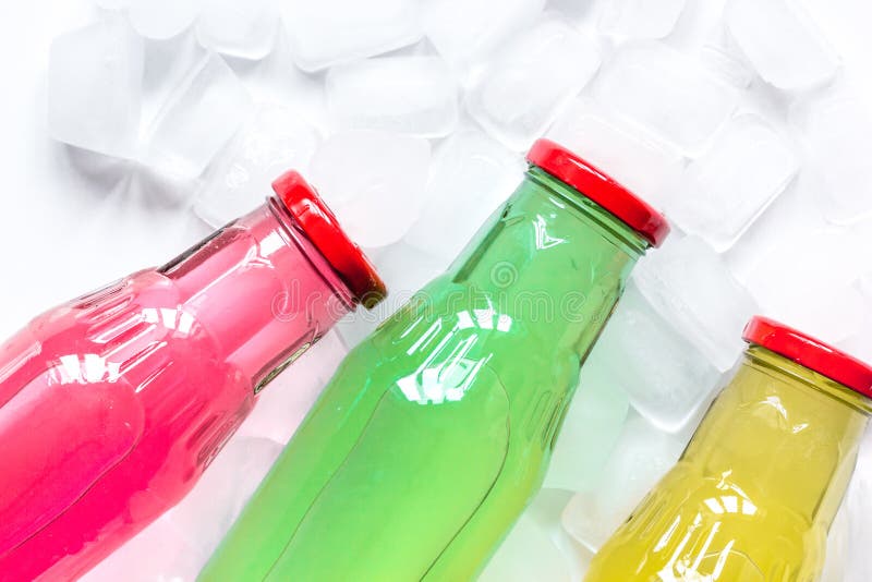 Download Cold Drinks In Plastic Bottles With Ice White Background Top View Mockup Stock Image - Image of ...