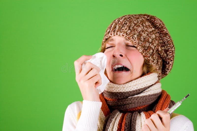 Cold girl sneezes