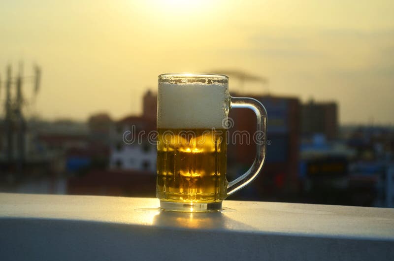 Beer in the sun stock image. Image of object, alcoholism 4143059
