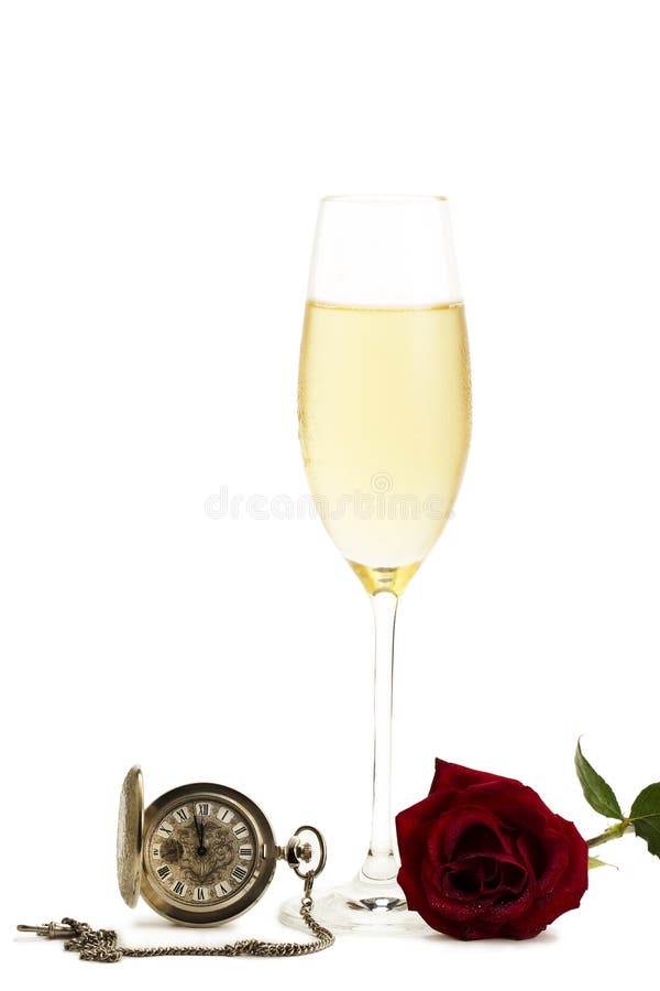 Cold glass with champagne with a red rose and a ol