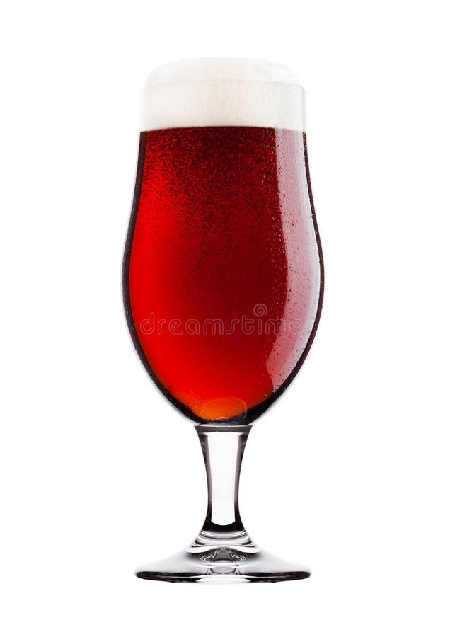 Cold glass of red bitter beer with foam and dew stock image Cold glass of red bitter beer with foam and dew stock image