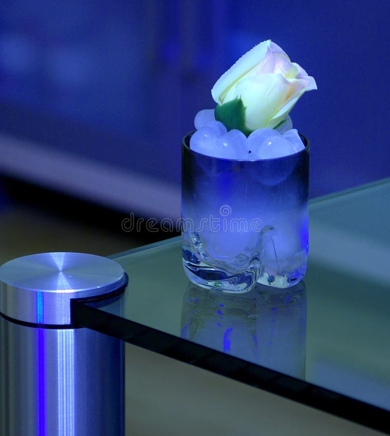 Cold ice drink with white rose