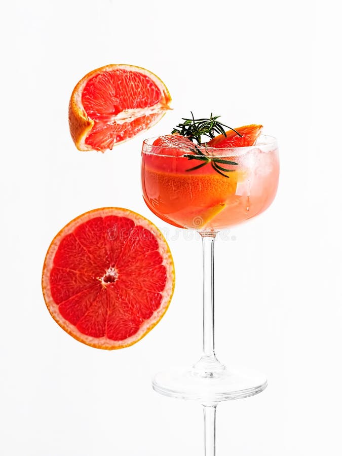 Cold Lemonade of Fresh Grapefruit Juice and Ice Cubes Decorated a Slice