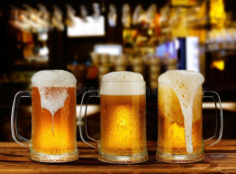 Cold light beer glass mug stock photo