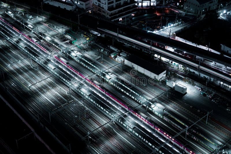 Cold light railway night view royalty free stock photo