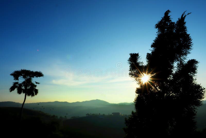 Cold Morning with Mountain Views and Warm Rays of the Sun. Stock Photo