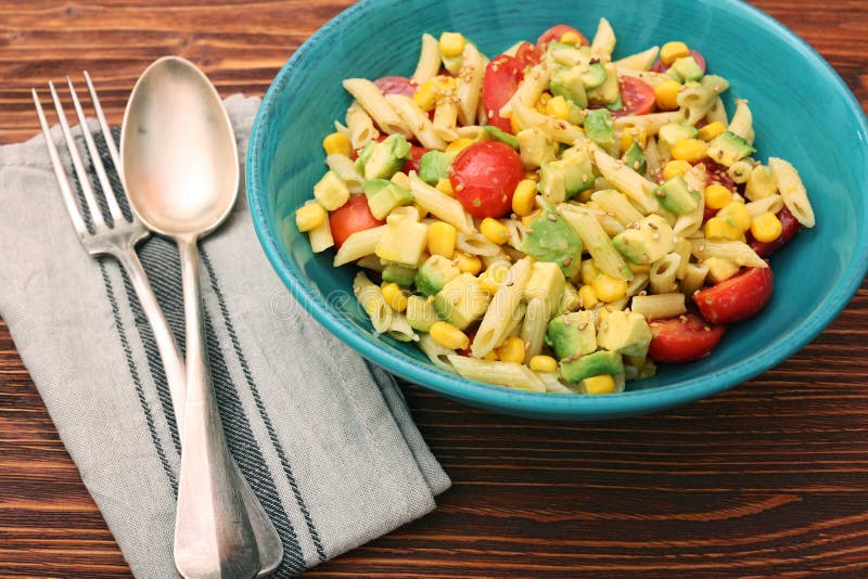 Cold Pasta Salad with Avocado, Tomato and Olive Oil Stock Photo - Image ...