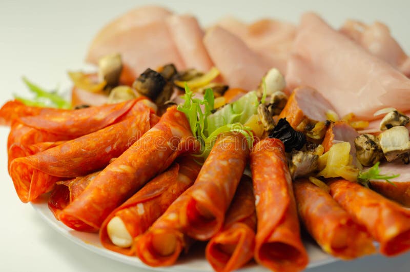 A Cold Plate Prepared for the Party with Sliced Chorizo, Ham and