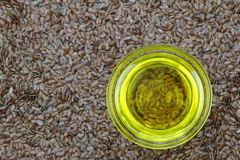 Cold pressed Linseed yellow oil on flaxseed