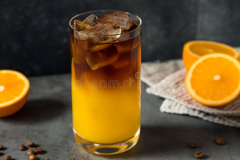 Cold Refreshing Orange Juice and Coffee Drink Stock Image Image of black, background 272554017