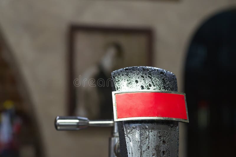 Cold silver beer tap with condensation stock photo Cold silver beer tap with condensation stock photo