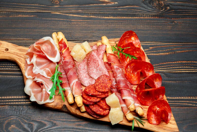 Cold Smoked Meat Plate With Pork Chops Prosciutto Salami And Bread