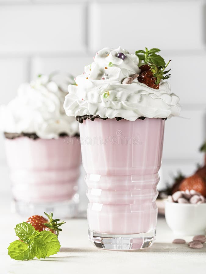 Strawberry Milkshake With Cream And Sauce In Take Away Cup Stock Photo,  Picture and Royalty Free Image. Image 58508331.