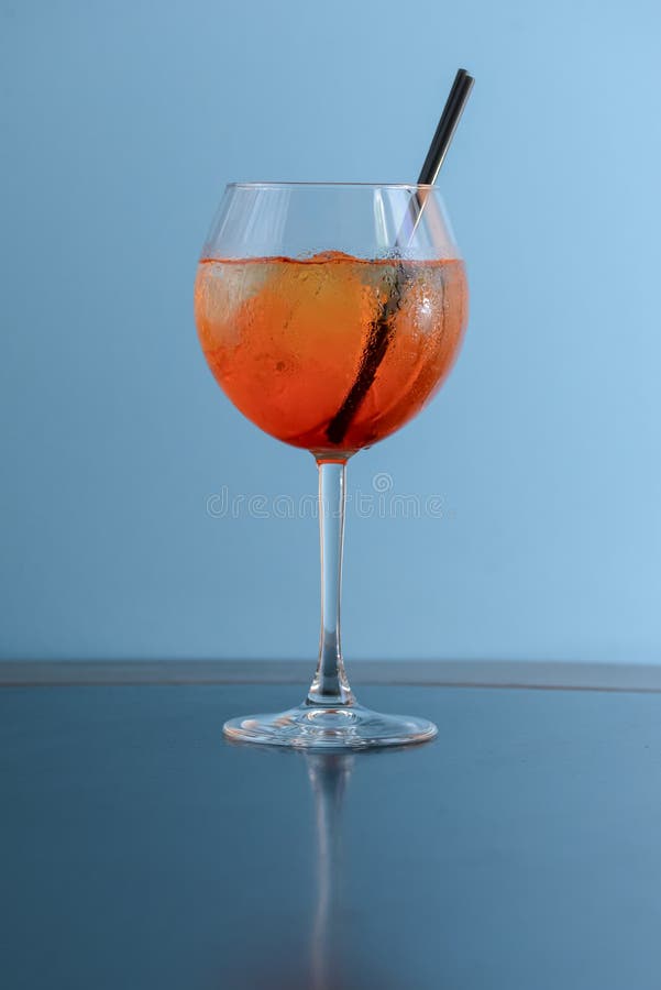 Cold Summer Alcohol Cocktail with Ice and Orange in a Wine Glass and ...