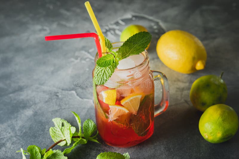 Cold Summer Drink with Lime and Mint Leaves. Natural Drinks Stock Photo