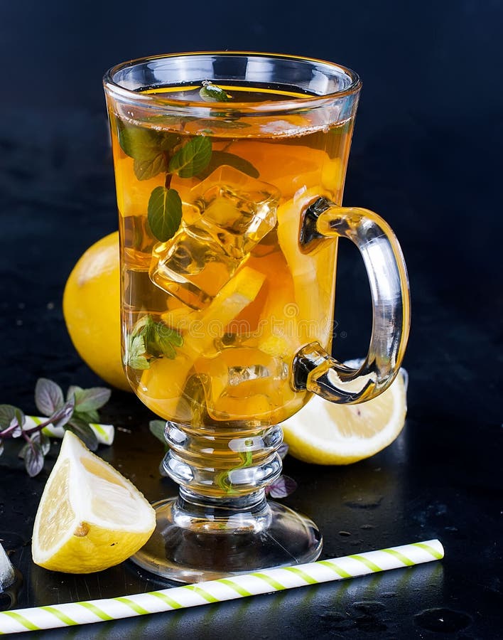 Cold tea with lemon, mint and ice