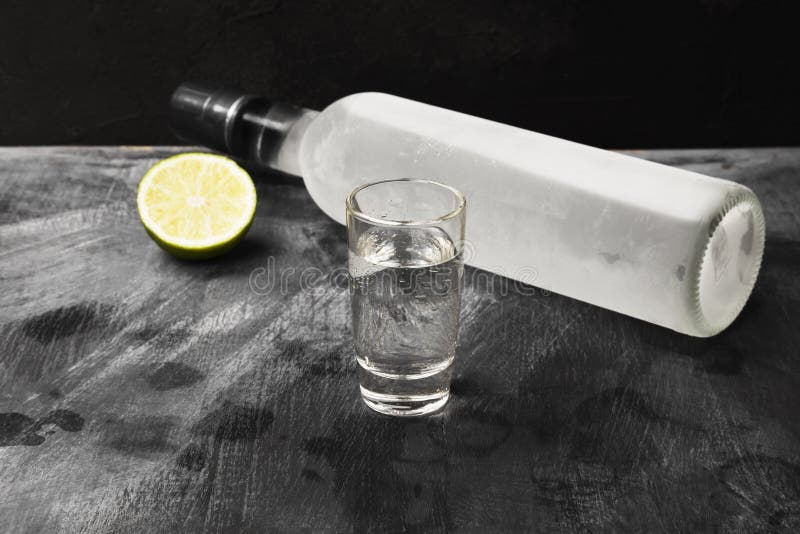 Cold Vodka in Shot Glasses on a Black Background Stock Photo Image of